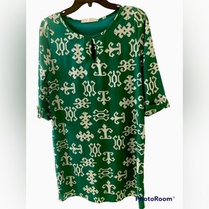 Small Peach Love cream green and white dress with underlining.